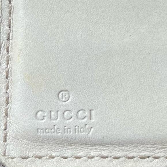 Gucci Ivory Monogram Leather Bifold Wallet - Picture 5 of 12